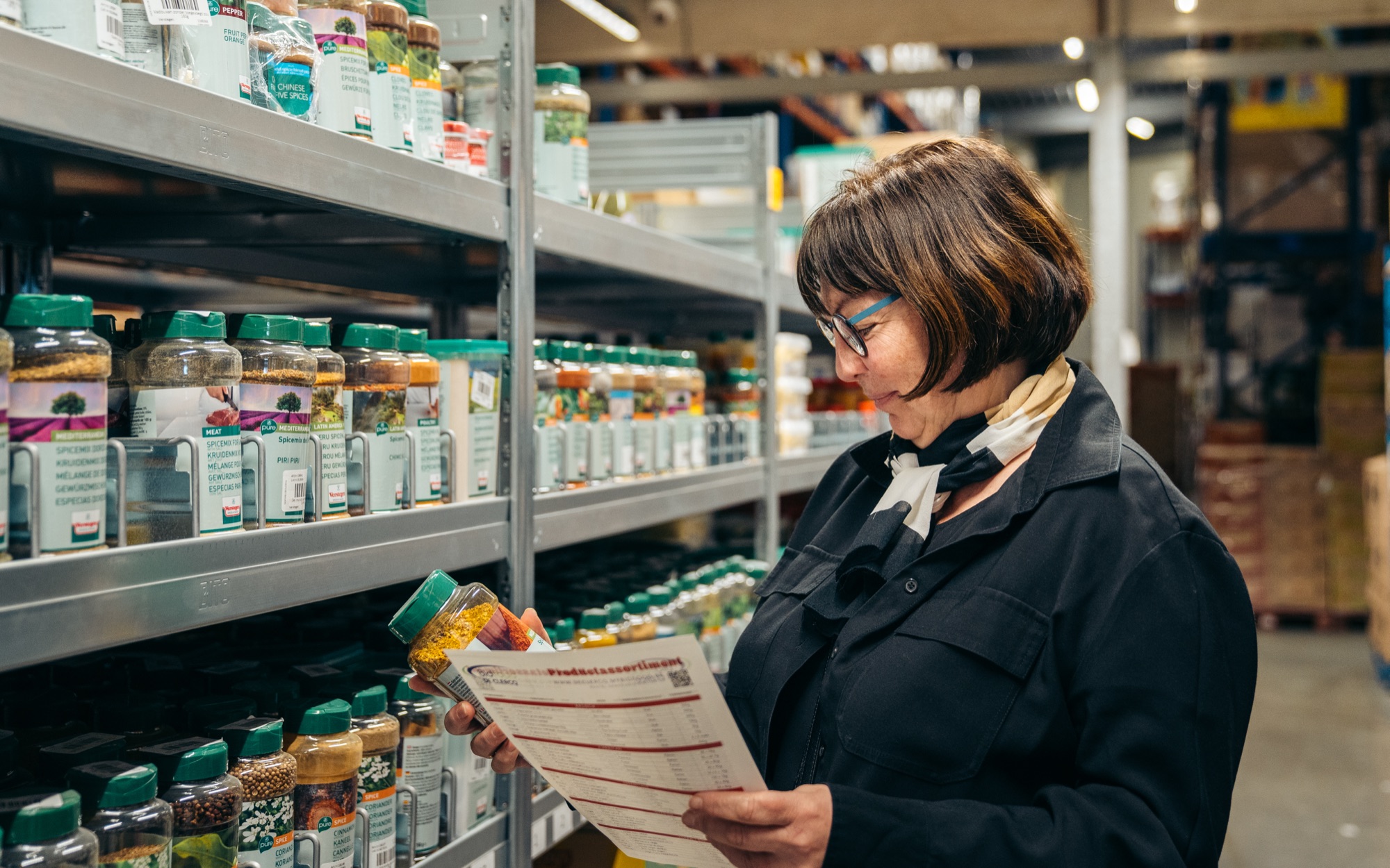 Customer browsing product shelf at Bidfood De Clercq
